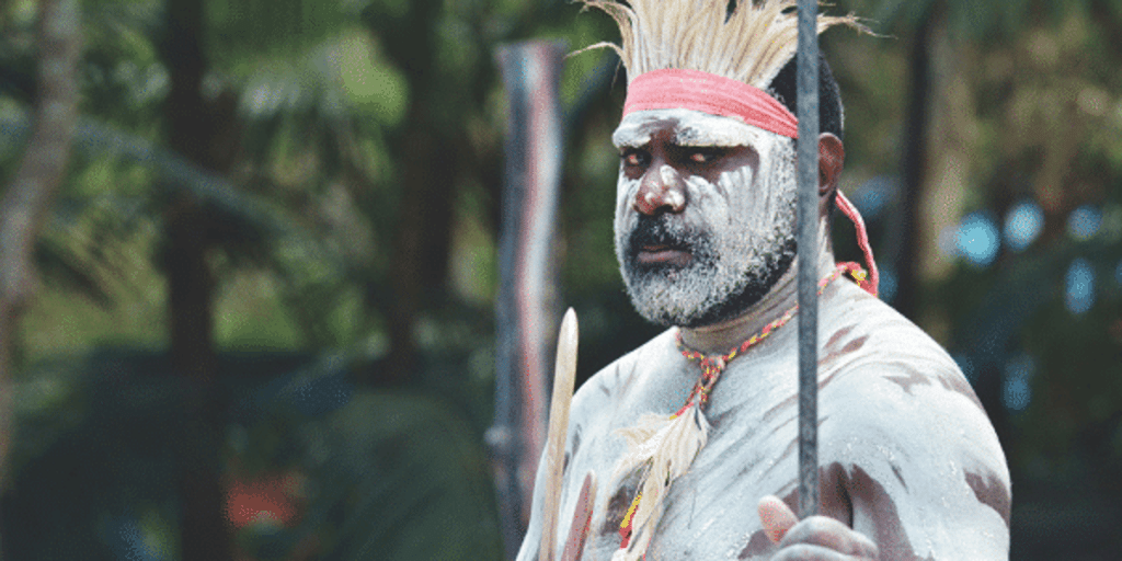 Proud Indigenous man in body paint