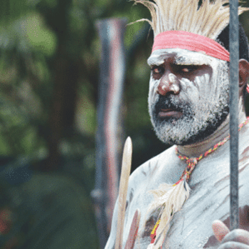 Proud Indigenous man in body paint
