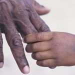 Aboriginal beliefs death afterlife culture hands holding each other
