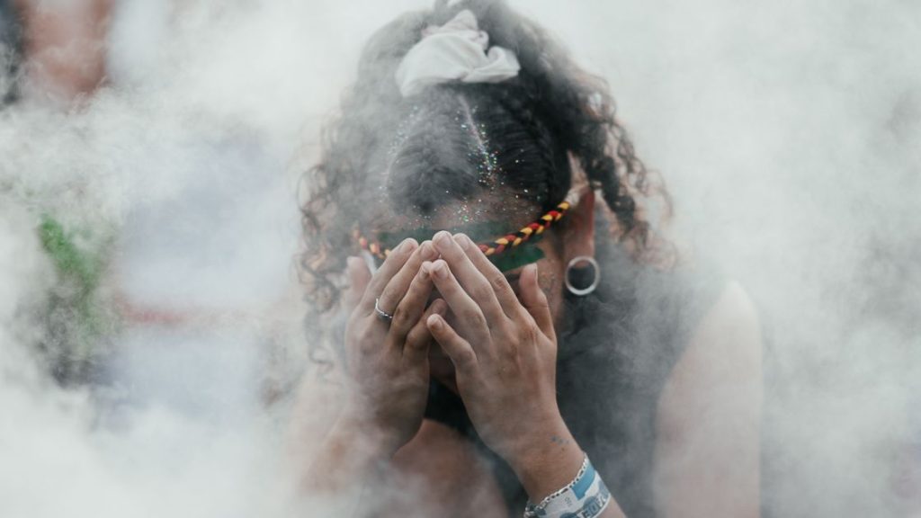Hod did assimilation impact Indigenous Australians: Picture of a First Nations person practicing a traditional ceremony