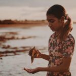 How to Embed Allyship into Your Organisation Evolve Communities Aboriginal girl on a beach Cultural Awareness